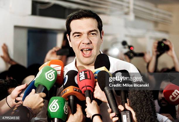 Greek Prime Minister Alexis Tsipras speaks to the press after placing his vote in the austerity referendum at a local school in the suburbs of Athens...