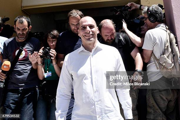 Greek Finance Minister Yanis Varoufakis speaks to the press after placing his vote in the austerity referendum at a local school in the suburbs of...