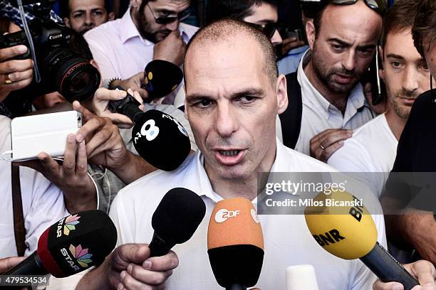 Greek Finance Minister Yanis Varoufakis speaks to the press after placing his vote in the austerity referendum at a local school in the suburbs of...