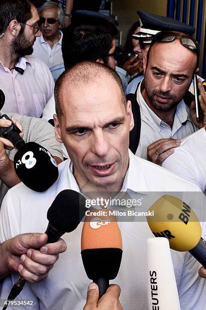 Greek Finance Minister Yanis Varoufakis speaks to the press after placing his vote in the austerity referendum at a local school in the suburbs of...