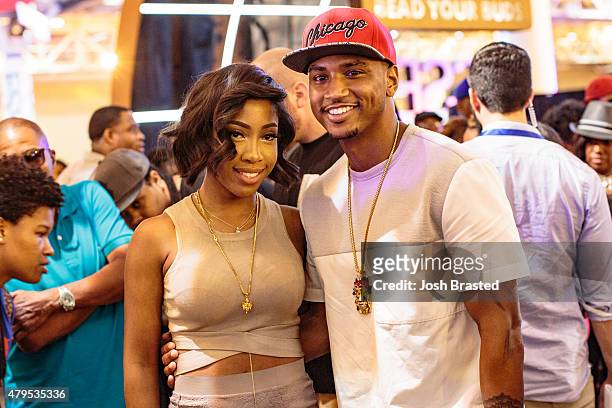 Sevyn Streeter and Trey Songz pose for a photo during the 2015 Essence Music Festival on July 4, 2015 in New Orleans, Louisiana.