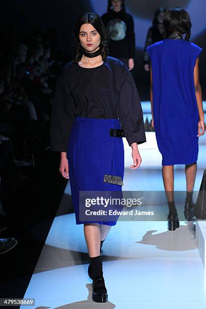 Model walks the runway during the Matiere Noir fashion show during World Mastercard fashion week on March 18, 2014 in Toronto, Canada.