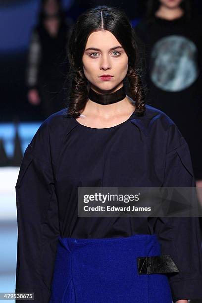 Model walks the runway during the Matiere Noir fashion show during World Mastercard fashion week on March 18, 2014 in Toronto, Canada.