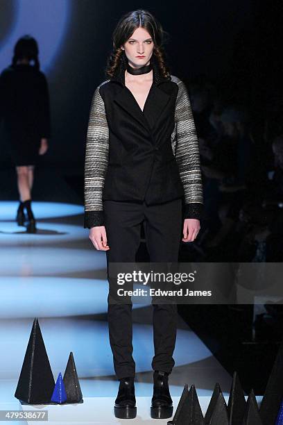 Model walks the runway during the Matiere Noir fashion show during World Mastercard fashion week on March 18, 2014 in Toronto, Canada.