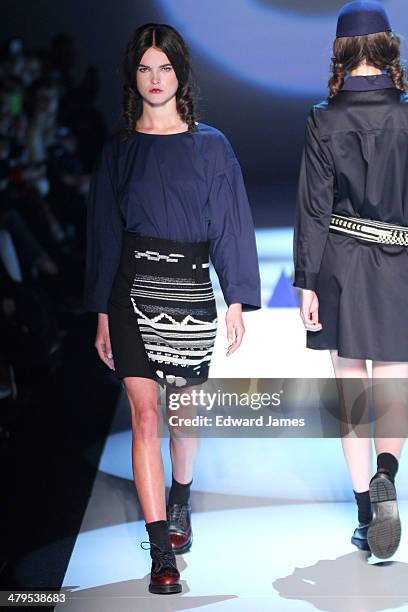 Model walks the runway during the Matiere Noir fashion show during World Mastercard fashion week on March 18, 2014 in Toronto, Canada.