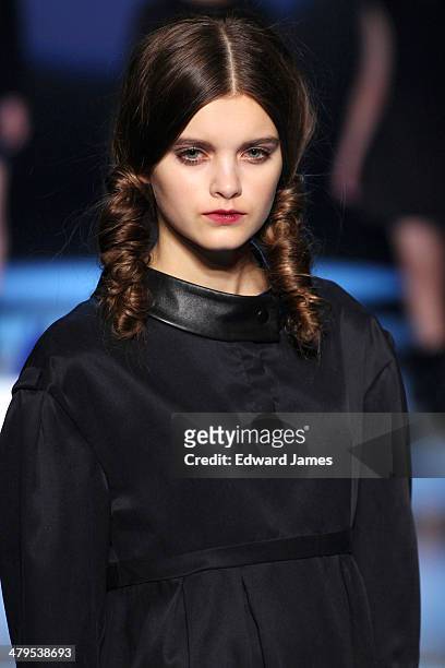 Model walks the runway during the Matiere Noir fashion show during World Mastercard fashion week on March 18, 2014 in Toronto, Canada.