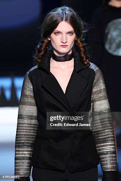 Model walks the runway during the Matiere Noir fashion show during World Mastercard fashion week on March 18, 2014 in Toronto, Canada.