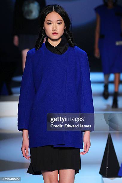 Model walks the runway during the Matiere Noir fashion show during World Mastercard fashion week on March 18, 2014 in Toronto, Canada.