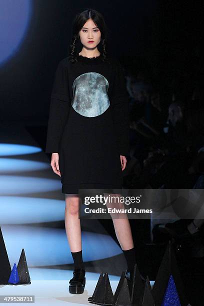 Model walks the runway during the Matiere Noir fashion show during World Mastercard fashion week on March 18, 2014 in Toronto, Canada.