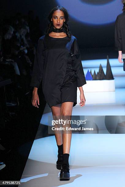 Model walks the runway during the Matiere Noir fashion show during World Mastercard fashion week on March 18, 2014 in Toronto, Canada.