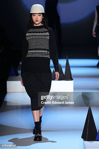 Model walks the runway during the Matiere Noir fashion show during World Mastercard fashion week on March 18, 2014 in Toronto, Canada.