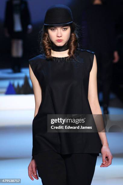 Model walks the runway during the Matiere Noir fashion show during World Mastercard fashion week on March 18, 2014 in Toronto, Canada.