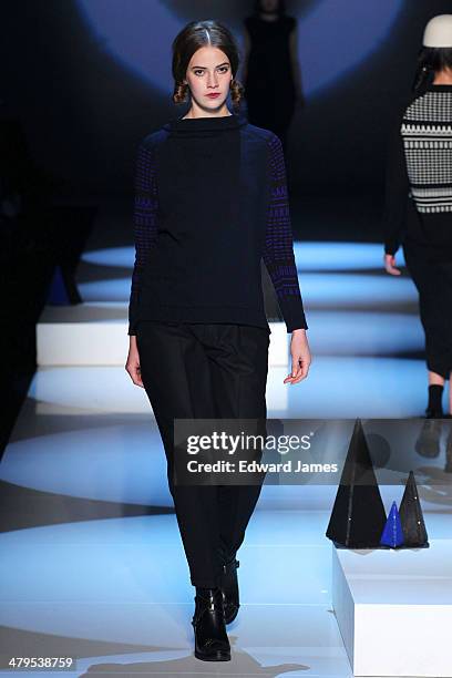 Model walks the runway during the Matiere Noir fashion show during World Mastercard fashion week on March 18, 2014 in Toronto, Canada.