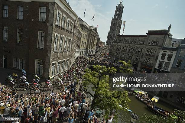 Riders take the start of the 166 km second stage of the 102nd edition of the Tour de France cycling race on July 5 between Utrecht and Neeltje Jans...