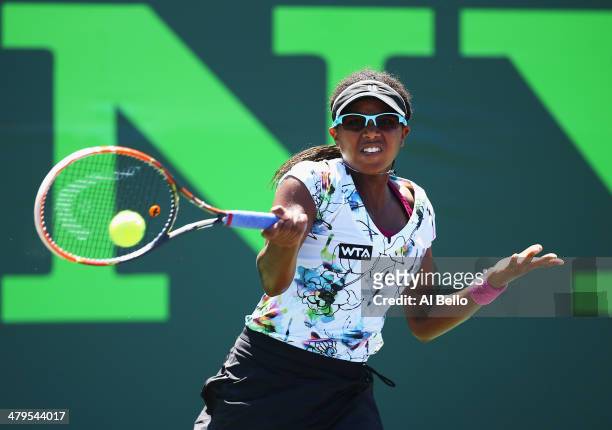 Victoria Duval of the USA returns a shot against Kiki Bertens of the Netherlands during their match on day 3 of the Sony Open at Crandon Park Tennis...
