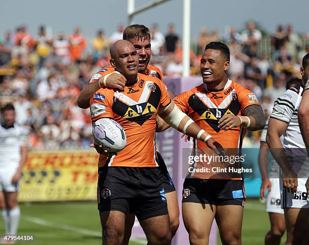 Jake Webster of Castleford Tigers celebrates after he scores the third try for his side during the First Utility Super League match between...