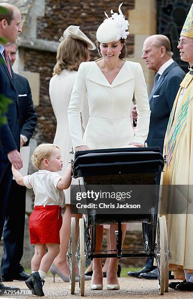 Catherine, Duchess of Cambridge, Prince William, Duke of Cambridge, Princess Charlotte of Cambridge and Prince George of Cambridge leave the Church...