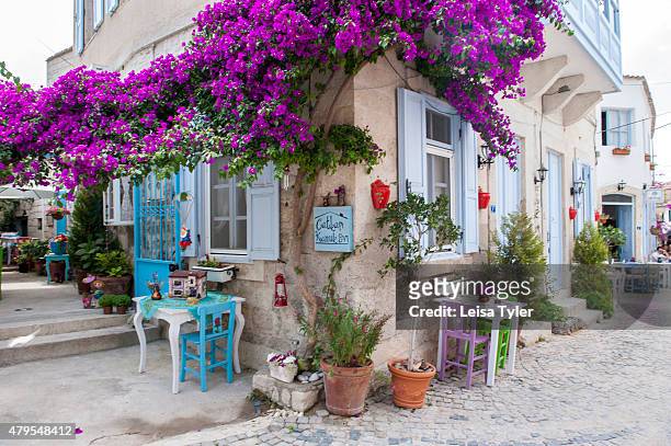 Street scene in the village of Alacati, a Greek built town on Turkey's Cesme Peninsula famous for its cobble streets and stone houses.