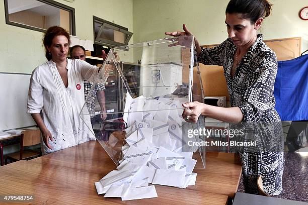 Voting officials count votes after polls are closed in Athens on July 5, 2015 in Athens, Greece. The people of Greece are going to the polls to...