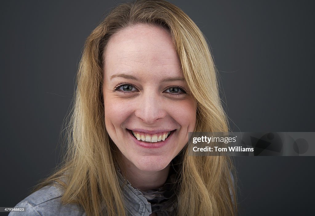 Connor Dake Meredith Dake of CQ Roll Call is photographed in their Washington ...