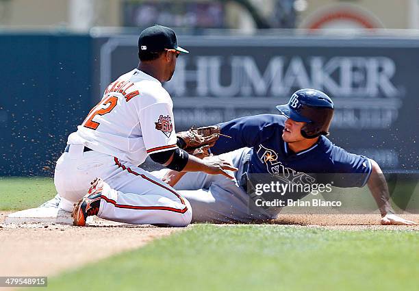 Wil Myers of the Tampa Bay Rays steals second base in front of second baseman Alexi Casilla of the Baltimore Orioles during the fourth inning of a...