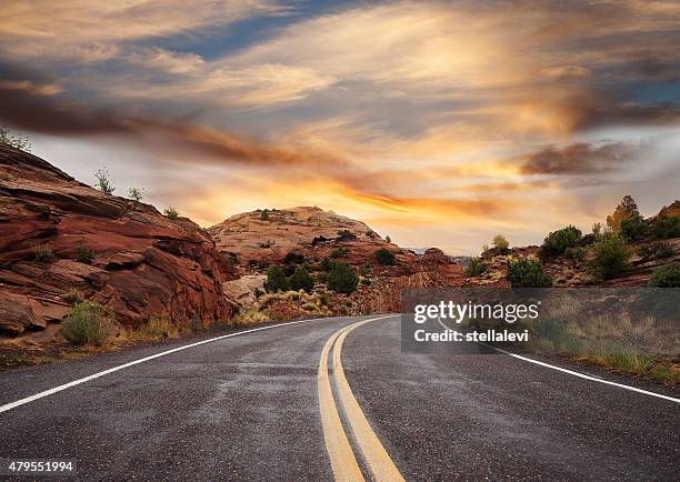 empty country road at sunset, utah, usa - utah scenics stock pictures, royalty-free photos & images