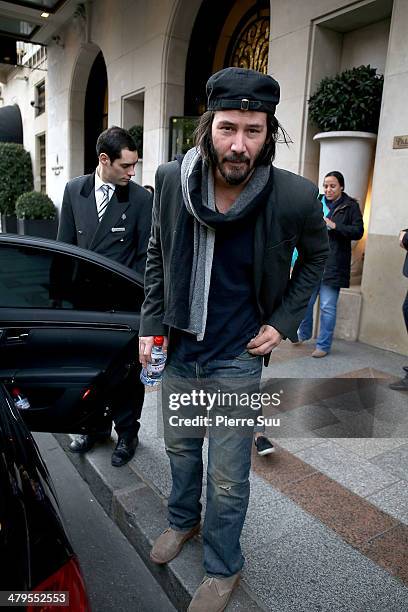 Actor Keanu Reeves leaves his hotel on March 19, 2014 in Paris, France.