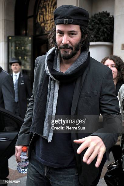 Actor Keanu Reeves leaves his hotel on March 19, 2014 in Paris, France.