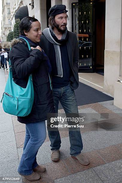 Actor Keanu Reeves leaves his hotel on March 19, 2014 in Paris, France.