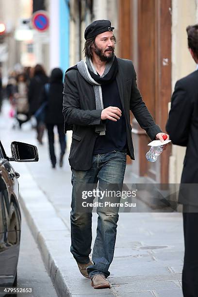 Actor Keanu Reeves strolling in "le Marais" district on March 19, 2014 in Paris, France.