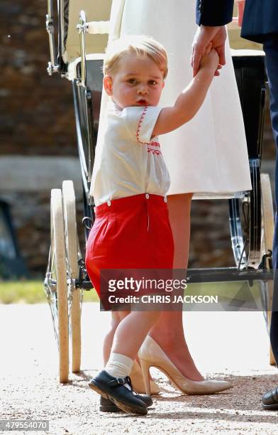 Prince George of Cambridge arrives for his sister Charlotte's Christening at St. Mary Magdalene Church in Sandringham, England, on July 5, 2015....