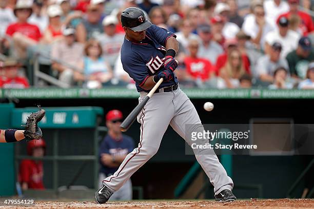 Wilkin Ramirez of the Minnesota Twins swings at a pitch in the fourth inning of a game against the St. Louis Cardinals at Roger Dean Stadium on March...
