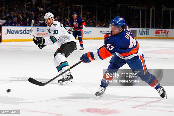 Mike Halmo of the New York Islanders skates against the San Jose Sharks at Nassau Veterans Memorial Coliseum on March 14, 2014 in Uniondale, New...
