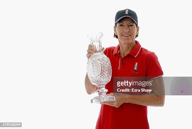 Solheim Cup captain Juli Inkster poses with the Solheim Cup prior to the start of the Founders Cup at the JW Marriott Desert Ridge Resort on March...