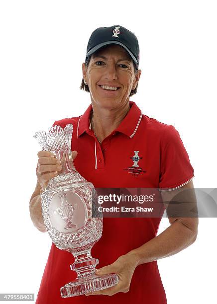 Solheim Cup captain Juli Inkster poses with the Solheim Cup prior to the start of the Founders Cup at the JW Marriott Desert Ridge Resort on March...