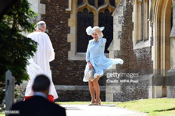 Camilla, Duchess of Cornwall arrives to the Church of St Mary Magdalene on the Sandringham Estate for the Christening of Princess Charlotte of...