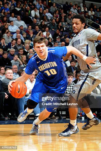 Grant Gibbs of the Creighton Bluejays dribbles the ball during college basketball game against the Georgetown Hoyas on March 4, 2014 at the Verizon...