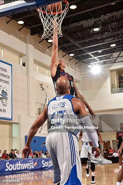 Diante Garrett of the Los Angeles Clippers goes for the layup against Sundiata Gaines of the Detroit Pistons during the game on July 5, 2015 at Amway...