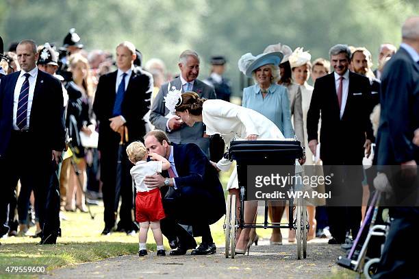 Prince Charles, Prince of Wales, Camilla, Duchess of Cornwall and Carole Middleto walk behind Catherine, Duchess of Cambridge, Prince William, Duke...