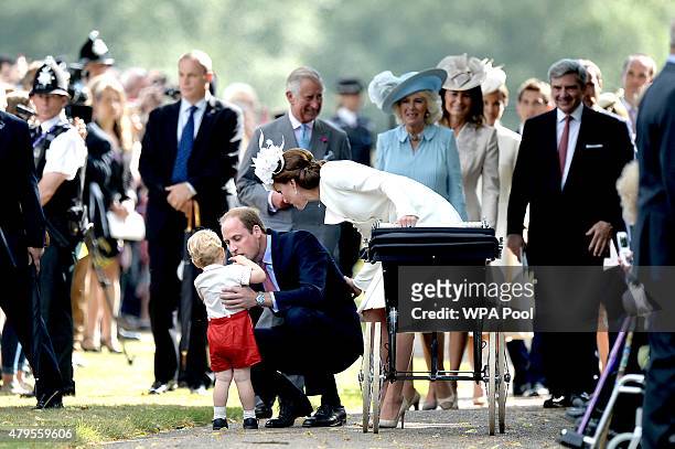 Prince Charles, Prince of Wales, Camilla, Duchess of Cornwall and Carole Middleto walk behind Catherine, Duchess of Cambridge, Prince William, Duke...