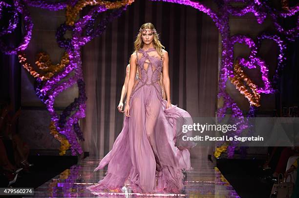 Karlie Kloss walks the runway during the Atelier Versace show as part of Paris Fashion Week Haute Couture Fall/Winter 2015/2016 on July 5, 2015 in...