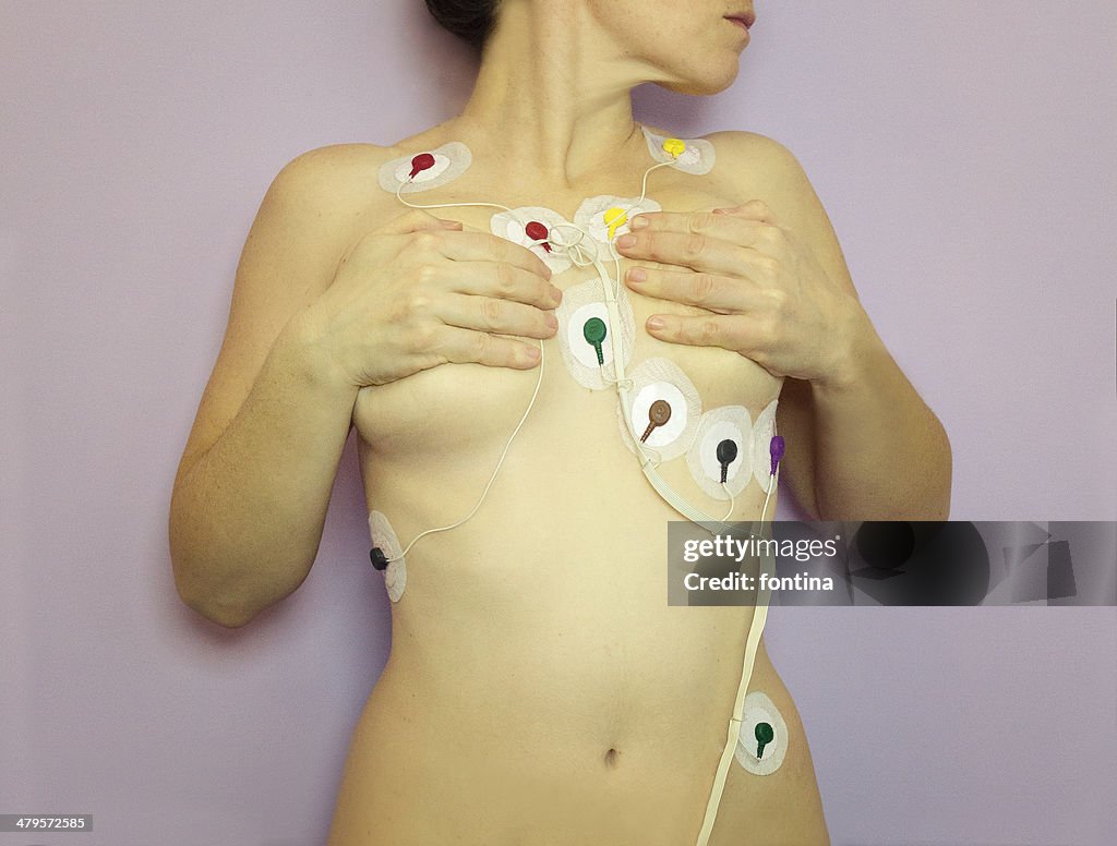 A woman wearing an ambulatory holter monitor