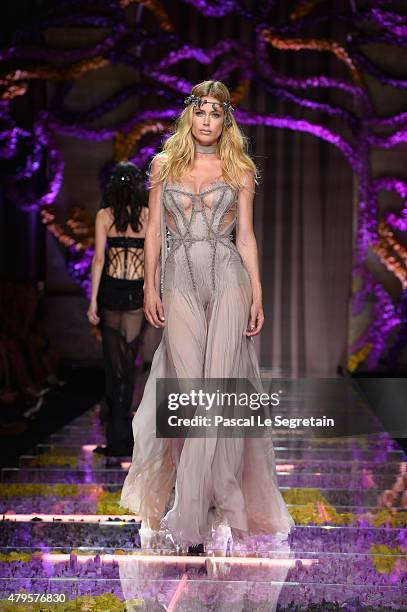 Doutzen Kroes walks the runway during the Atelier Versace show as part of Paris Fashion Week Haute Couture Fall/Winter 2015/2016 on July 5, 2015 in...
