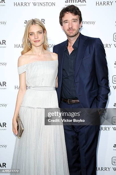 Natalia Vodianova and Antoine Arnault attend the amfAR dinner at the Pavillon LeDoyen during the Paris Fashion Week Haute Couture on July 5, 2015 in...