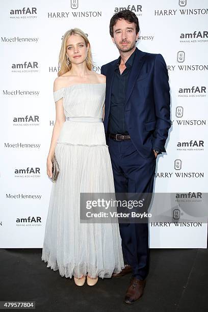 Natalia Vodianova and Antoine Arnault attend the amfAR dinner at the Pavillon LeDoyen during the Paris Fashion Week Haute Couture on July 5, 2015 in...