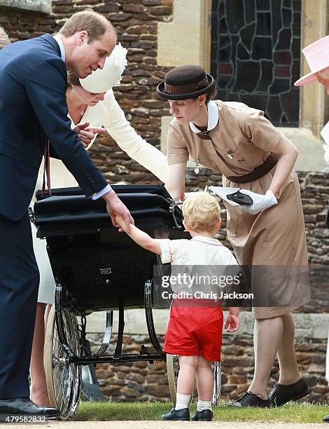 Prince George's nanny, Maria Teresa Turrion Borrallo helps arrange Princess Charlotte of Cambridge's pram as she leaves the Church of St Mary...