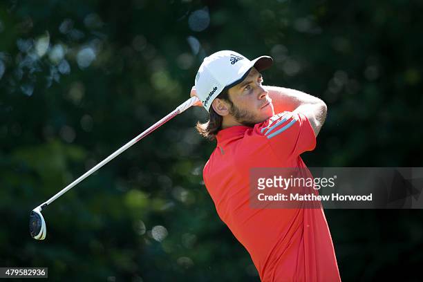 Footballer Gareth Bale takes a shot during the annual Celebrity Cup golf tournament at Celtic Manor Resort on July 4, 2015 in Newport, Wales. The...