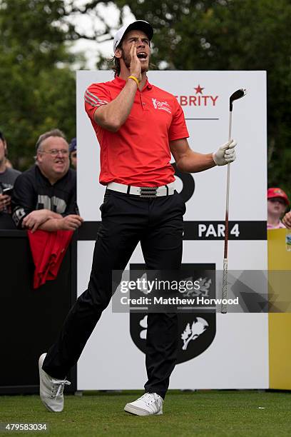 Footballer Gareth Bale shouts 'four' during the annual Celebrity Cup golf tournament at Celtic Manor Resort on July 4, 2015 in Newport, Wales. The...