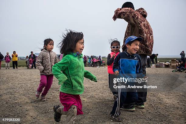 Yupik children compete in foot races as a part of Fourth of July celebrations on July 4, 2015 in Newtok, Alaska. Newtok is one of several remote...