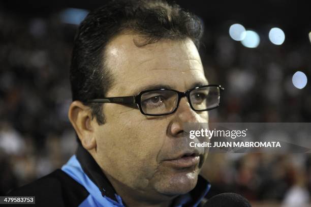 Brazil's Gremio coach Enderson Moreira speaks to the press ahead of the Copa Libertadores 2014 group 6 football match against Argentina's Newell's...